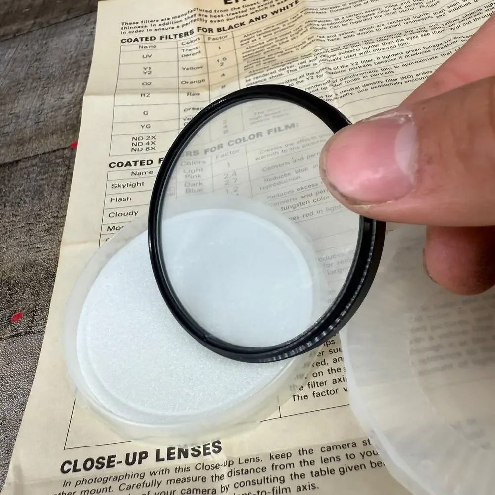 Sakar 52mm Camera Lens Filter Coated UV 58MM W/ Paper Guide